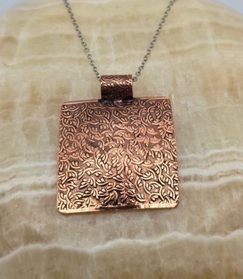 “Verdigris Echo” Embossed Copper Pendant Necklace