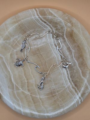 Ocean Whispers – Wave-Link Charm Bracelet Ocean Whispers – Wave-Link Charm Bracelet