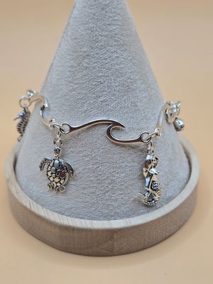 Ocean Whispers – Wave-Link Charm Bracelet