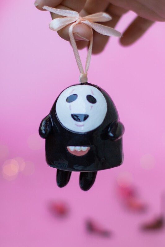 Faceless spirit ceramic bell