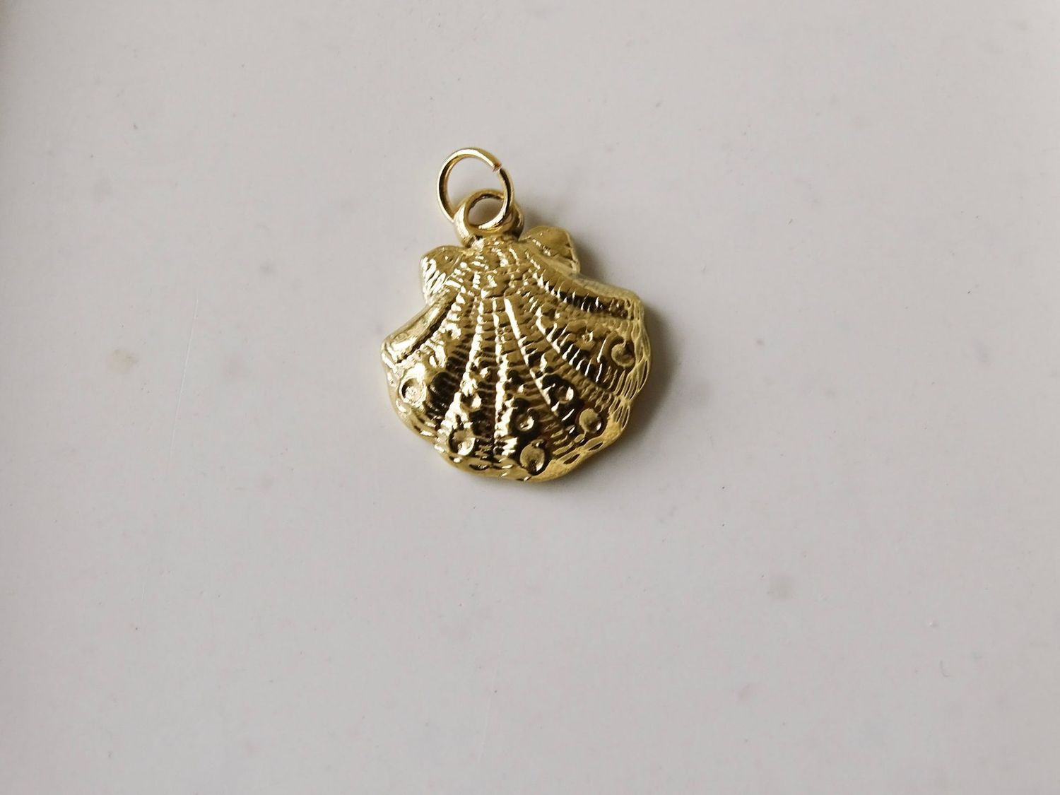 Charm - golden shell Charm - golden shell