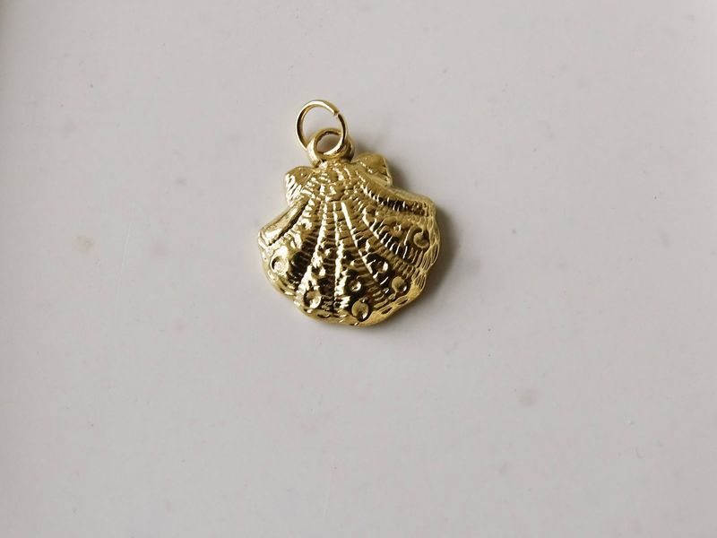 Charm - golden shell Charm - golden shell