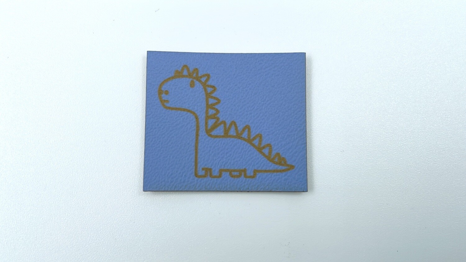 Kunstleder Label "Dino" Graublau