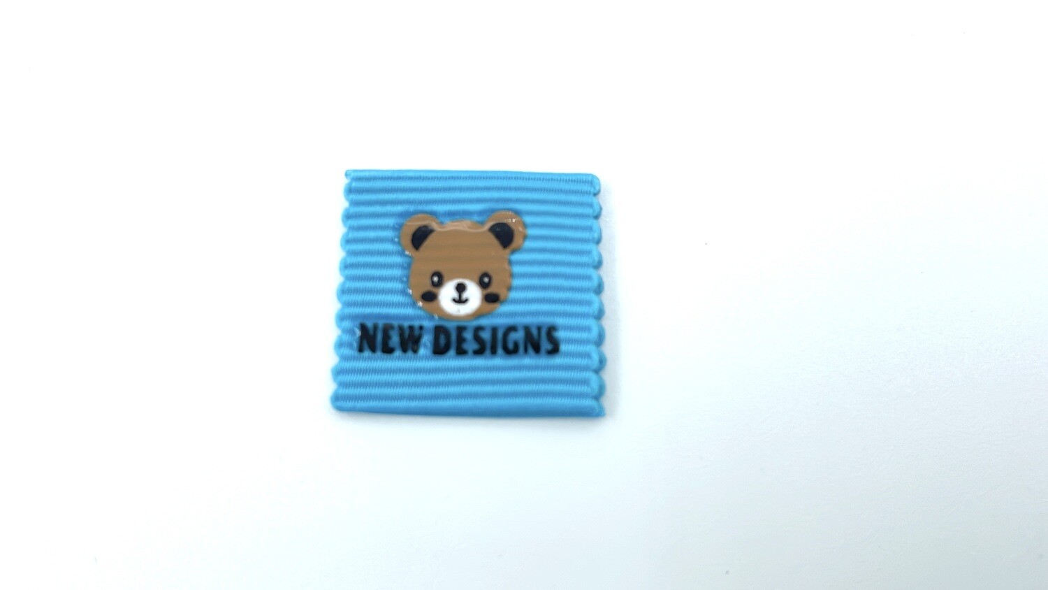 Label "New Designs" Himmelblau Aufnäher Etikett