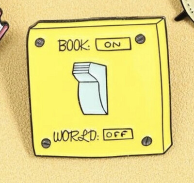 Pin book on / world off