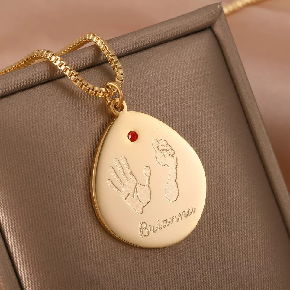 Hand and Foot Print Necklace.