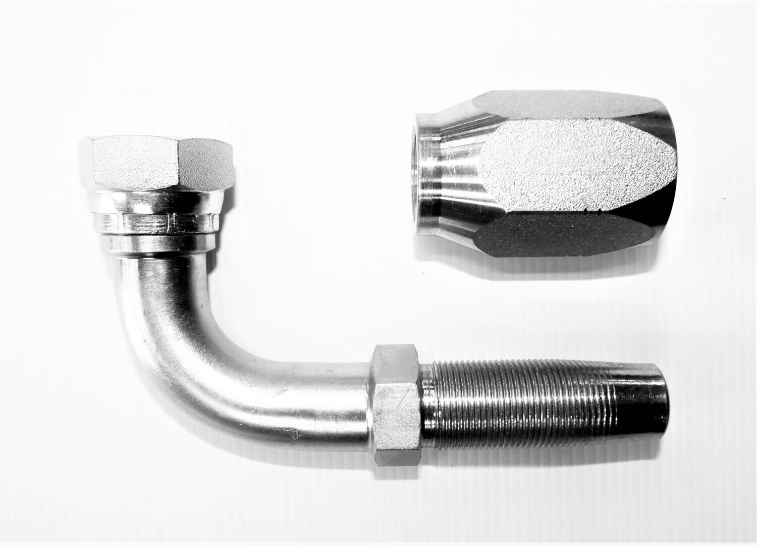 set of 90-degree JIC Field Fit Reusable Hydraulic Hose Fittings with swept bend elbow.