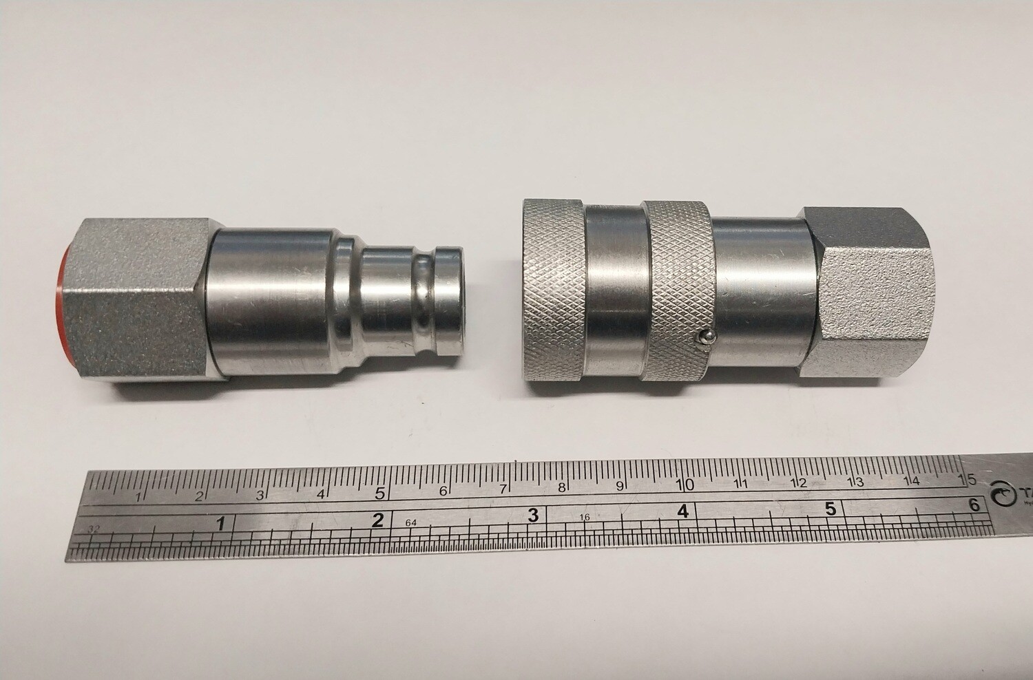Top view of 3/8 flat face Hydraulic couplers verticle next to each other. 