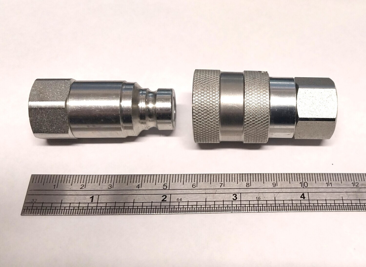 Top view of 1/4 inch dry break flat face coupler for low oil flow applications
