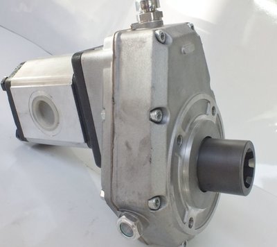 Aluminium Speed increase gearbox showing splined female tractor input Socket at below right and gear pump mounted to speed increase output shaft at top left. 