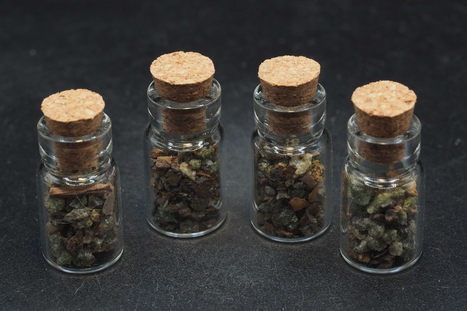 Small glass vial with trinitite chips