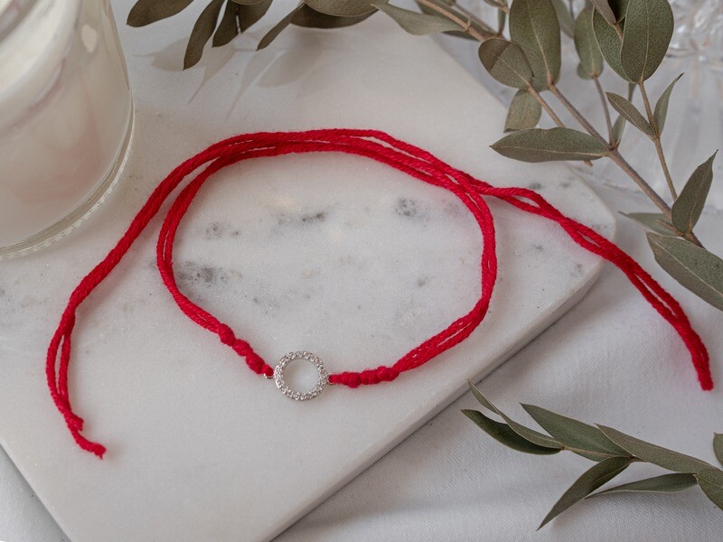 Red String with a Silver Circle