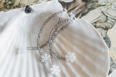 Silver earrings with snowflakes