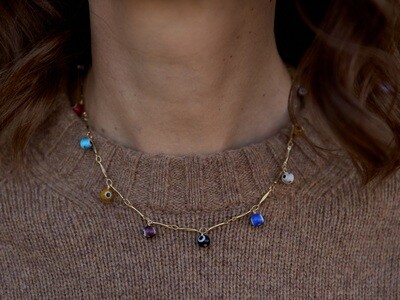 Gold plated necklace with glass eyes