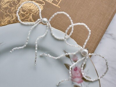 Earrings &quot;Bows&quot; made of pearls
