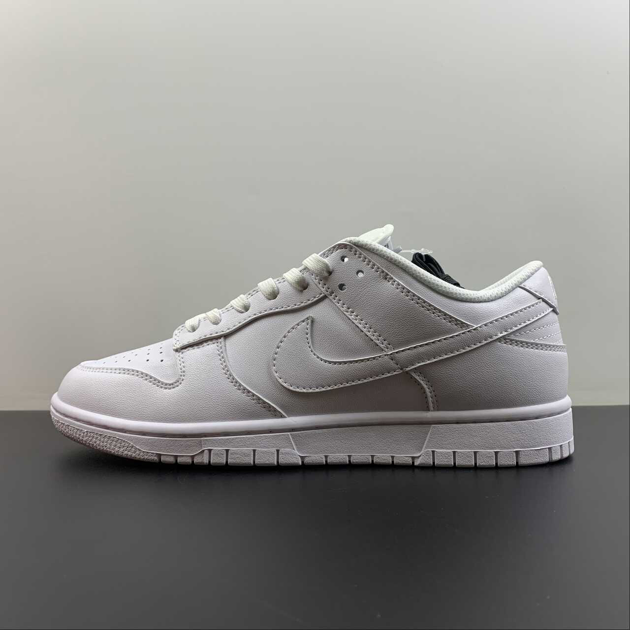 SB Dunk Low “ Triple White”