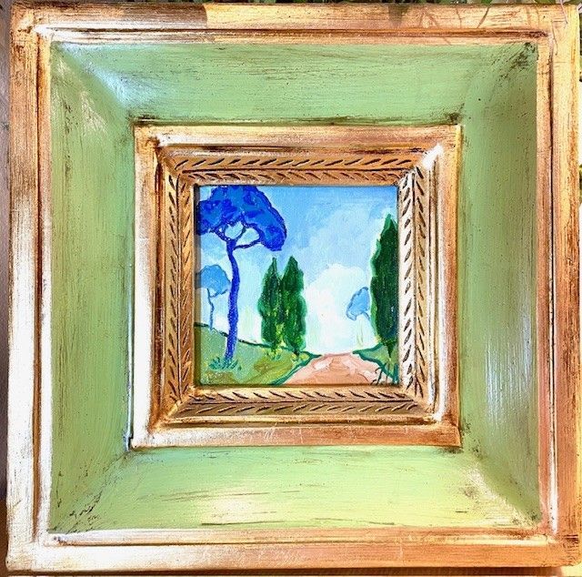 Mini toile dans un cadre vert