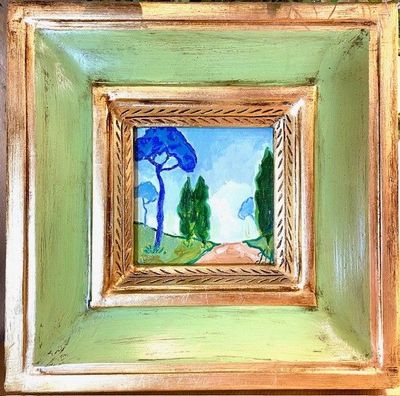 Mini toile dans un cadre vert