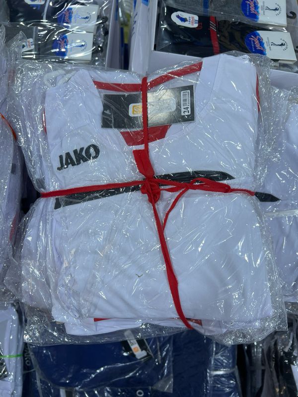 طقم رياضي ولادي Jako B2001 ابيض بأحمر #