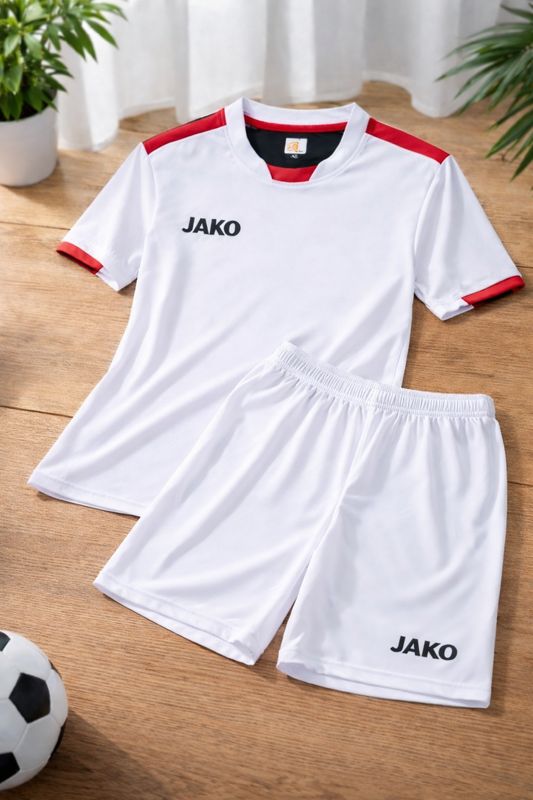 طقم رياضي ولادي Jako B2001 ابيض بأحمر #