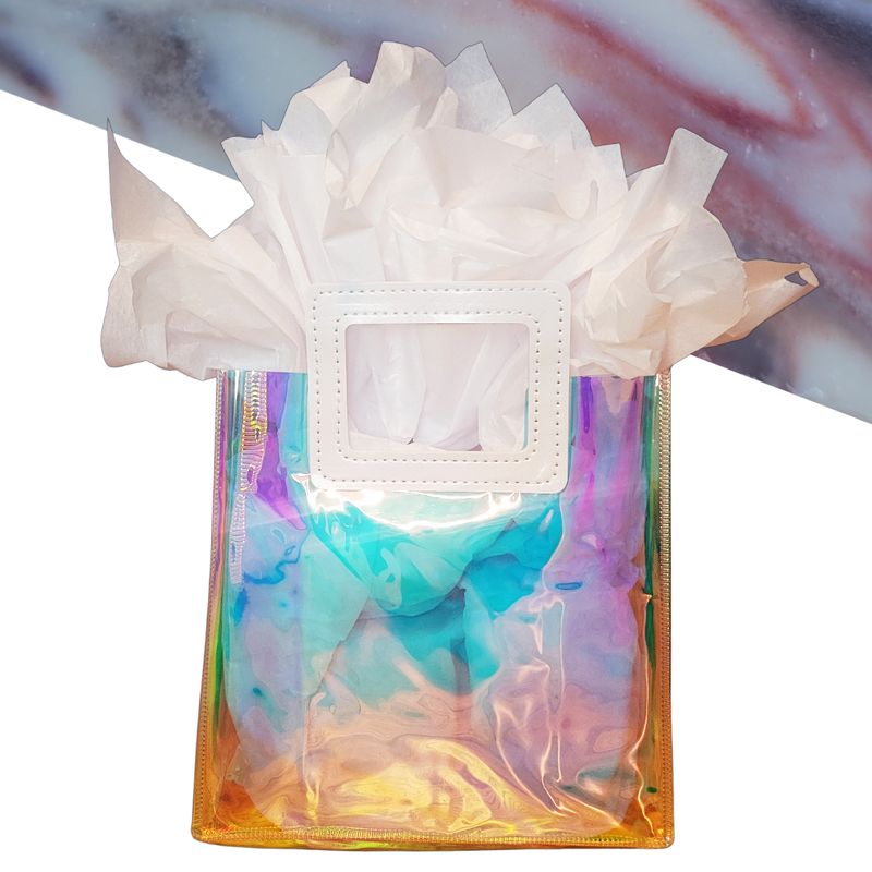 iridescent gift bag with cinnamon soap in background