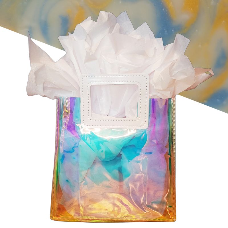 iridescent gift bag with star showers soap in background