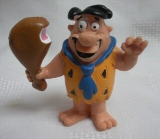 2 1/2"H Fred Flintstone "Leg" PVC Figure