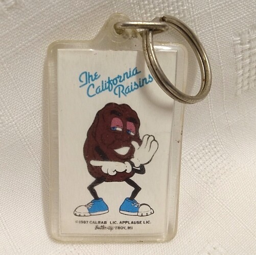 California Raisin Justin X Grape Plastic Keychain
