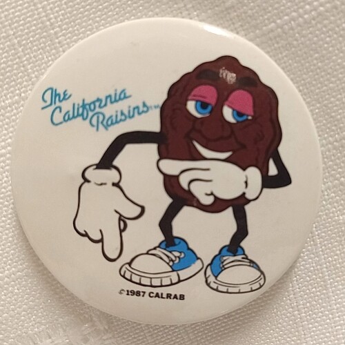 1 1/2&quot;D California Raisin Justin X Grape Pinback Button