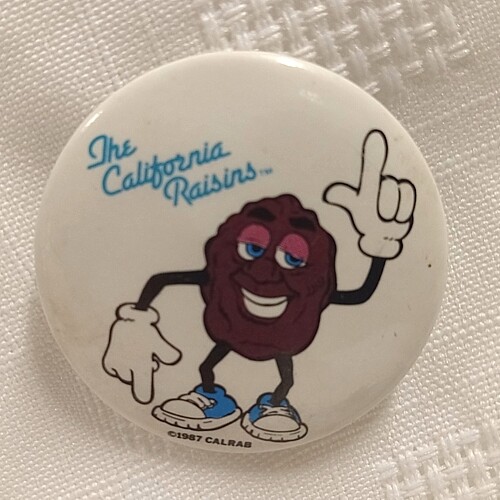 1 1/2&quot;D California Raisin Justin X Grape Pinback Button
