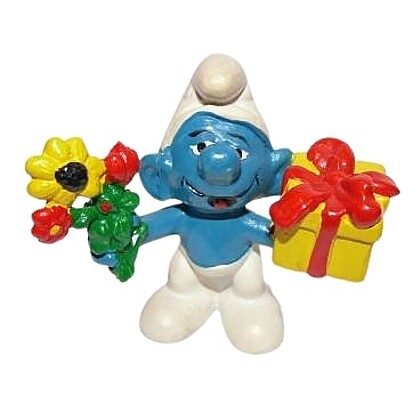 The Smurfs 2 1/4"H Gift Smurf with Flowers and Present PVC