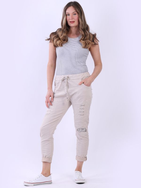 Ripped effect sequin magic pants