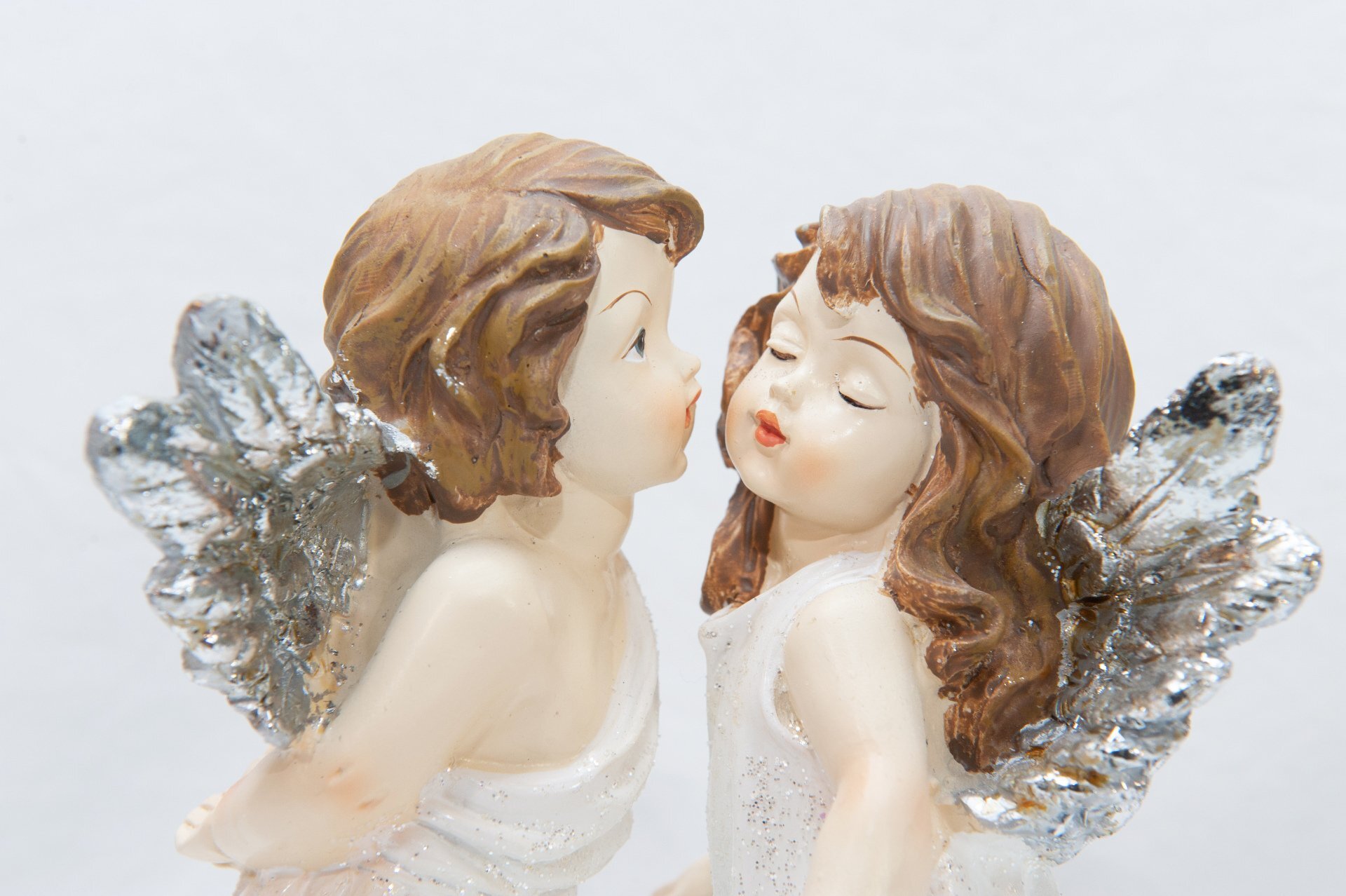 COPPIA DI ANGELI POLY SU CUORE