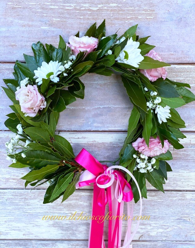 Coroncina d'alloro con fiori da 55€ a 65€