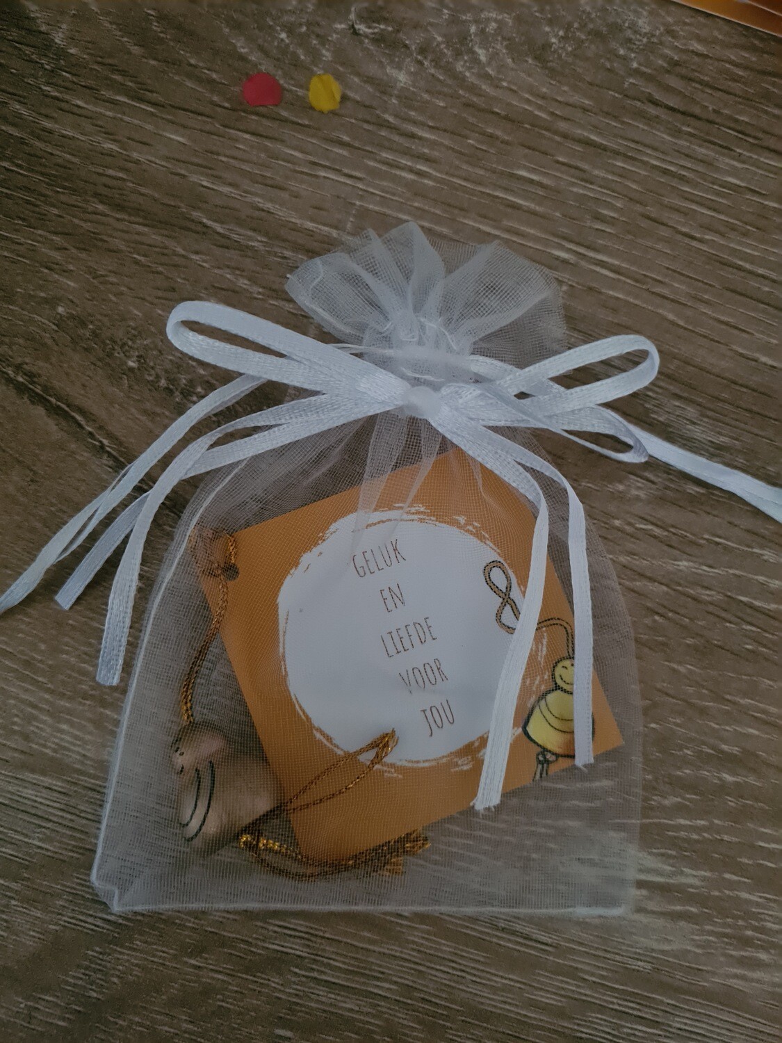 gouden boedha in tasje  met kaartje