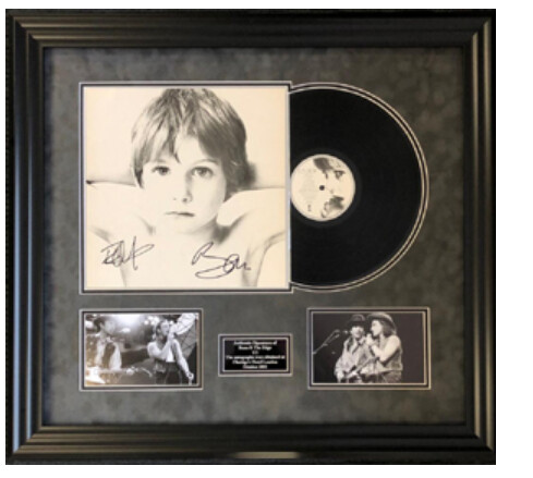 Albulm Signed  U2 Signed Autograph Album  Signed + COA U2 Signed Autograph Album QUADRO AutografatO Signed single record The Boy album hand signed clearly in black marker by Bono and The Edge