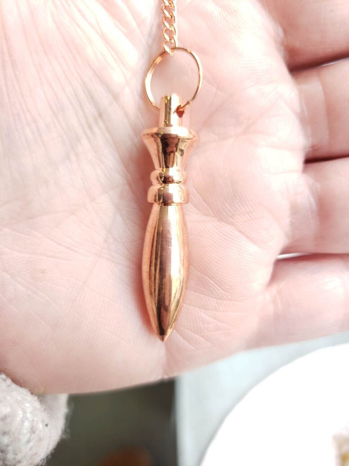 pendule Karnac cuivre