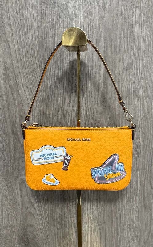 Muñequera Michael Kors