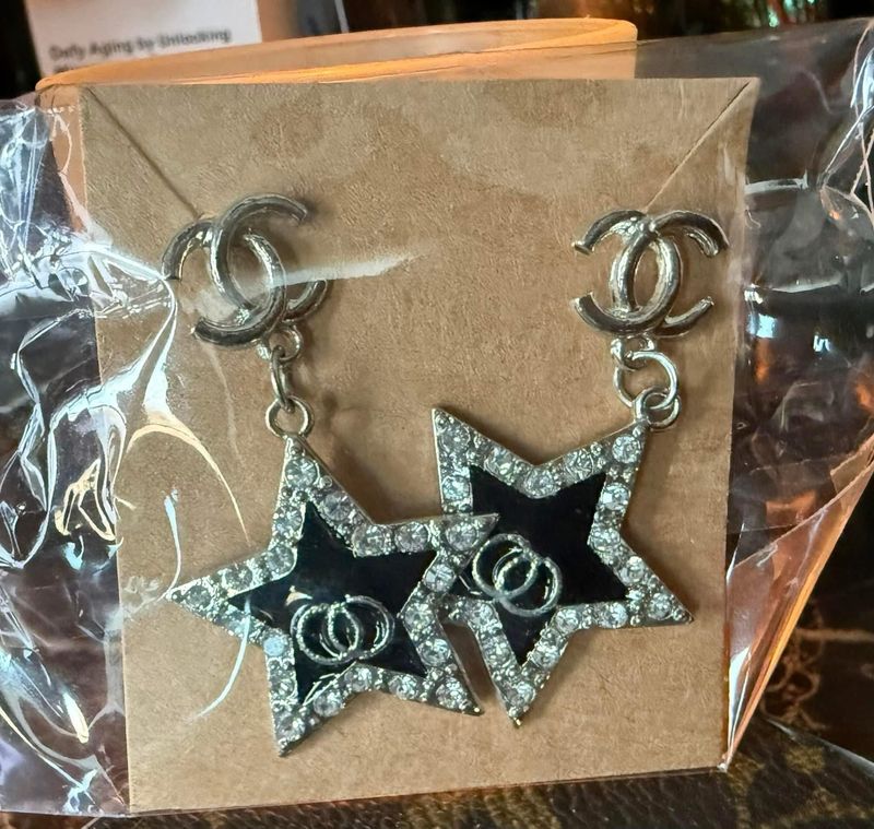 CC Silver Star Dangling Earrings