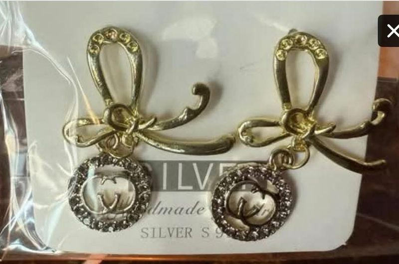 CC Gold Ribbon Dangle Earrings