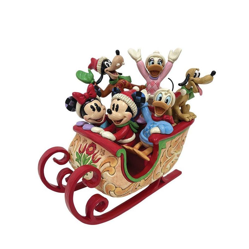 Disney Traditions Mickey & Freunde Schlitten Disney Traditions Mickey & Freunde Schlitten"A sleigh full of Joy"