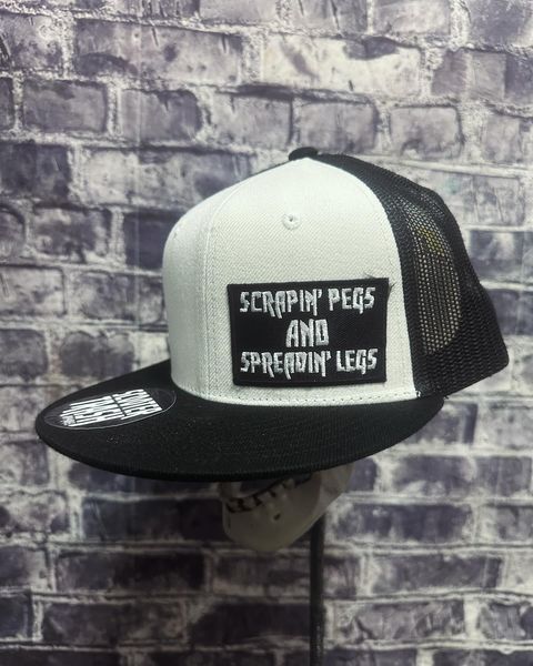SCRAPIN PEGS AND SPREADIN LEGS -WHITE - PATCH - WHITE HAT BLACK BILL AND BLACK MESH BACK- SNAP BACK