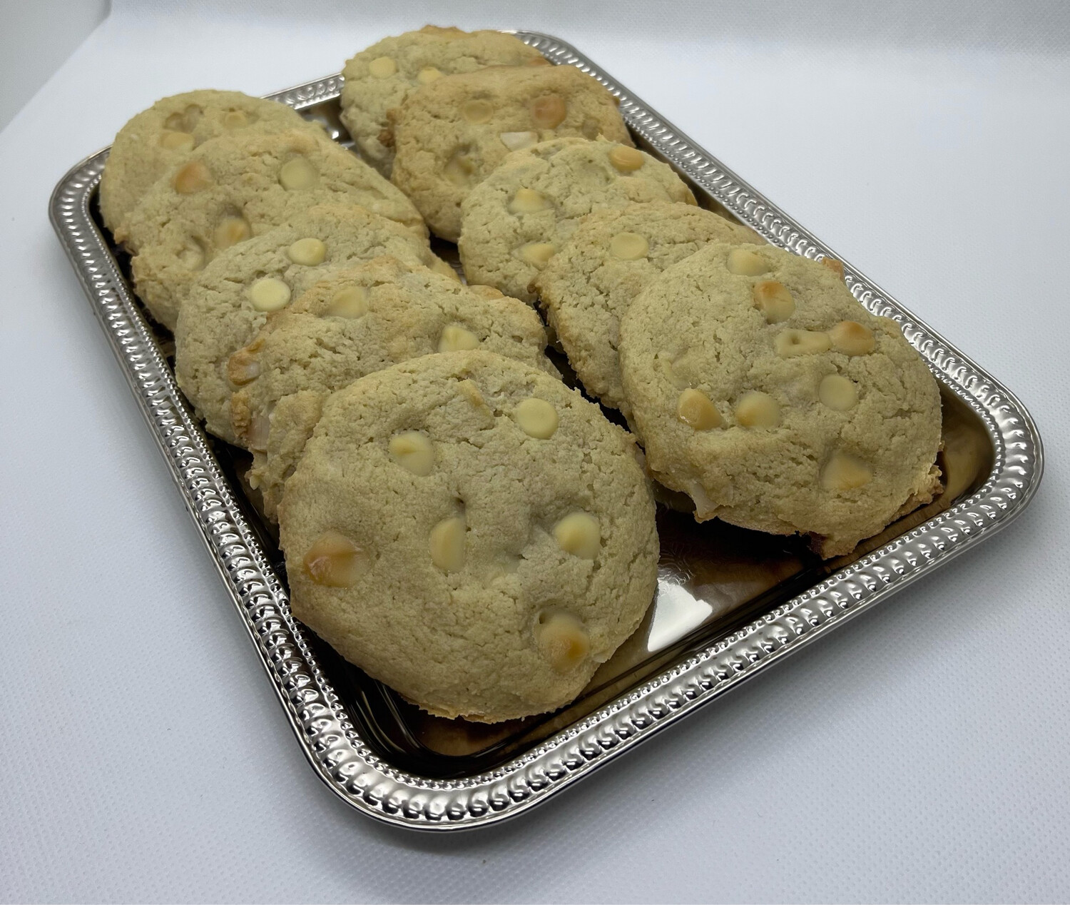 My dog ate white clearance chocolate macadamia nut cookies