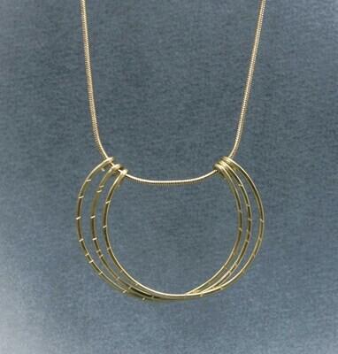 A minimalist brass necklace with 3 textured half hoops.  The chain is adjustable.