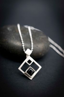 Meet our Onyx Silver pendant that is just under 1 inch square.