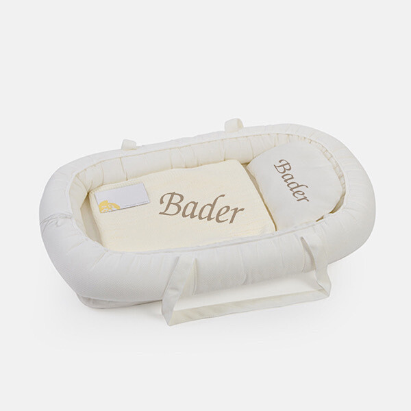 Off white Bed with blanket