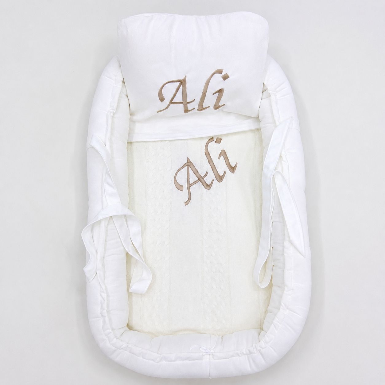 Off white Bed with blanket