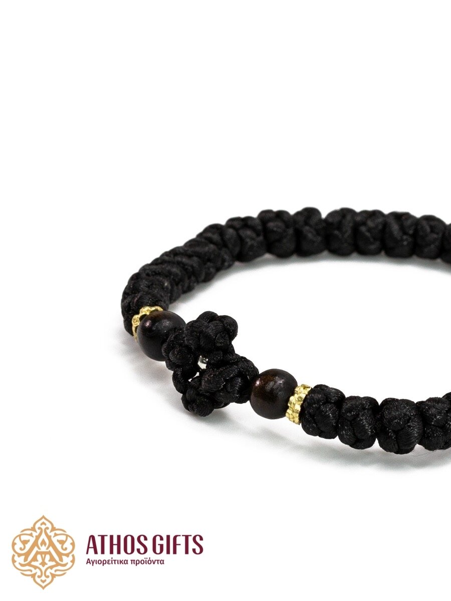 Handmade braided bracelet with cross