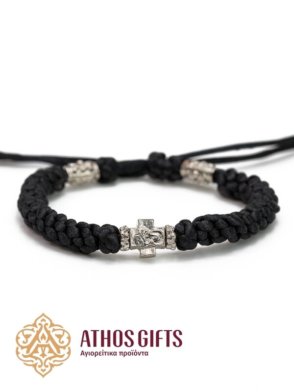Braided bracelet with metal cross