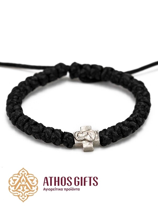Braided bracelet with metal cross